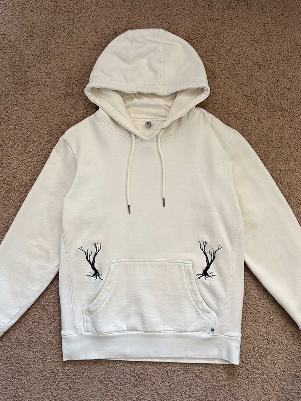Cream Pullover Hoodie with Embroidered Graphics